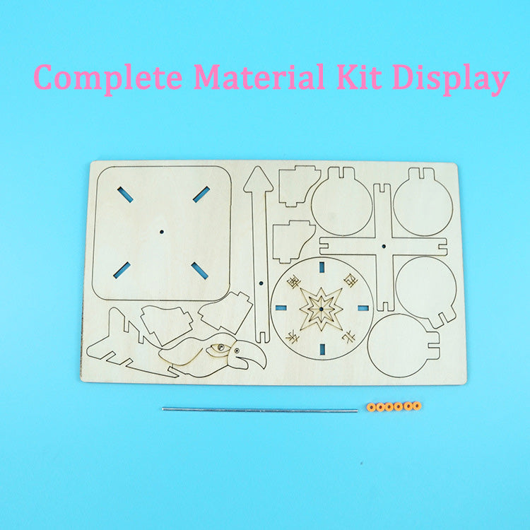 Complete DIY Weather Vane Kit contents: Laser-cut wood pieces, metal rod, and spacers for easy construction.
