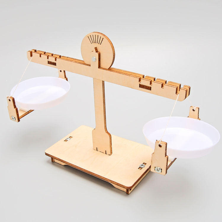 Close-up of the assembled wooden Balance Scale