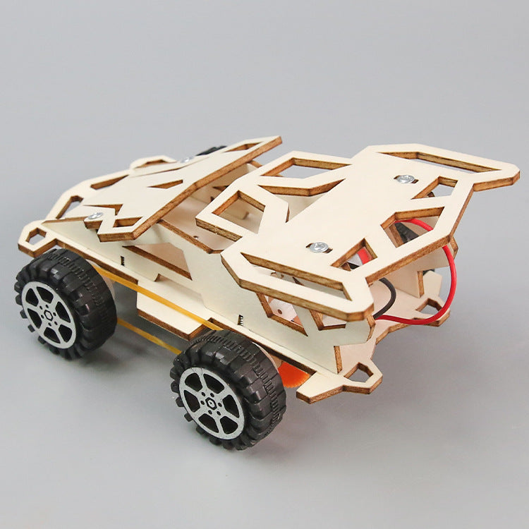 Multiple views of the assembled DIY Electric 4WD Car Kit, demonstrating its sturdy wooden design and readiness for play.