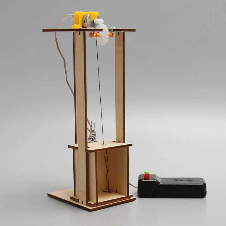 Close-up of the elevator's motor and gear mechanism, highlighting the engineering aspects of the DIY kit.