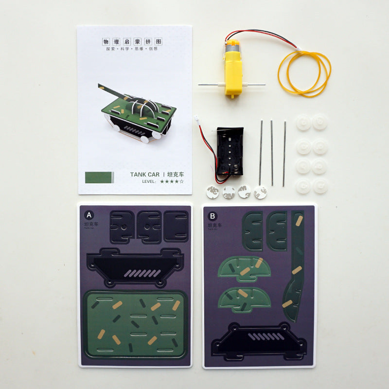 Open DIY Tank Kit showing all included components: cardboard tank parts, motor, battery pack, wheels, axles, rubber bands, and manual.