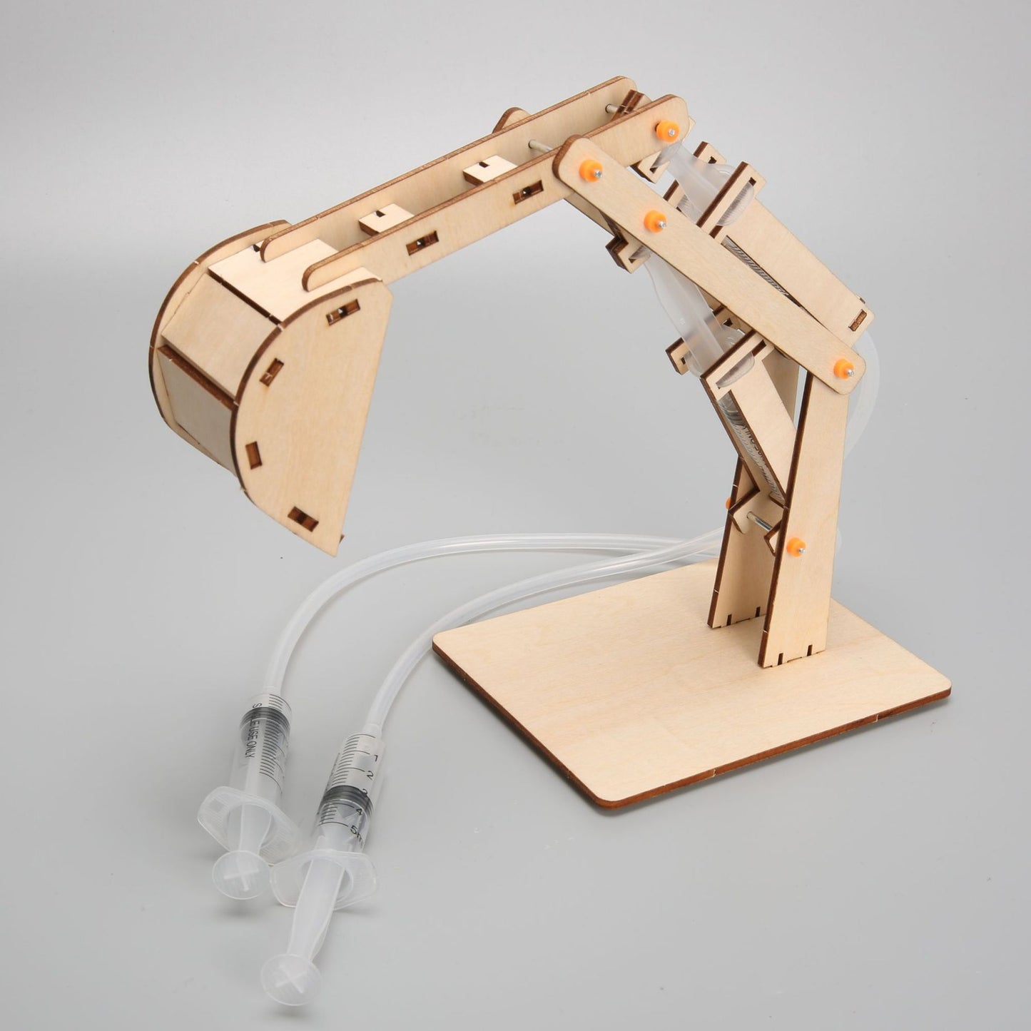 Assembled DIY Hydraulic Excavator Kit made of wood, highlighting its design and educational appeal.
