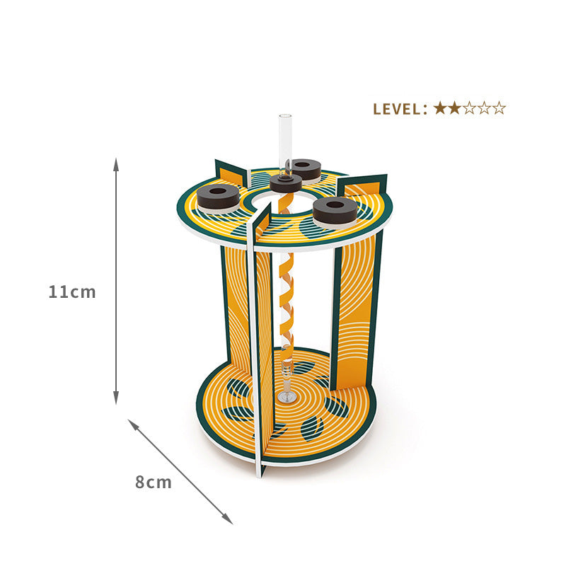 Educational STEM toy for kids: close-up of the DIY Perpetual Pen Kit's magnetic perpetual motion mechanism.