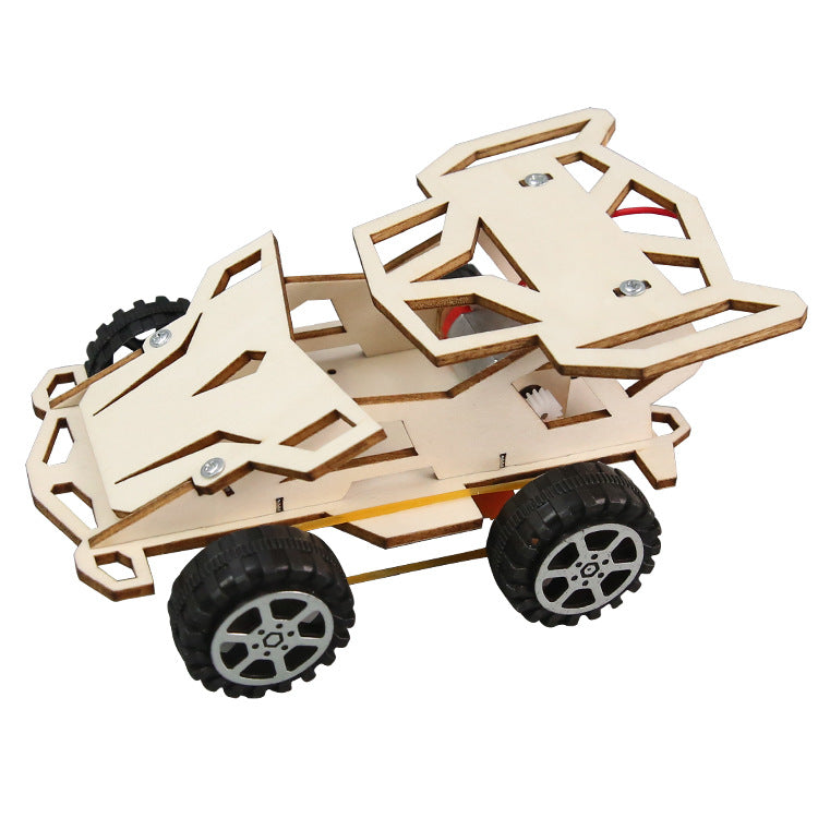 Close-up of a child assembling the DIY Electric 4WD Car Kit, highlighting detailed wooden parts and easy construction.