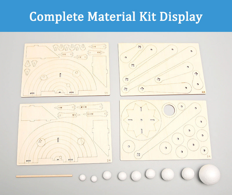 Contents of DIY Orrery Solar System Kit: laser-cut wooden pieces, foam planets, and assembly stick