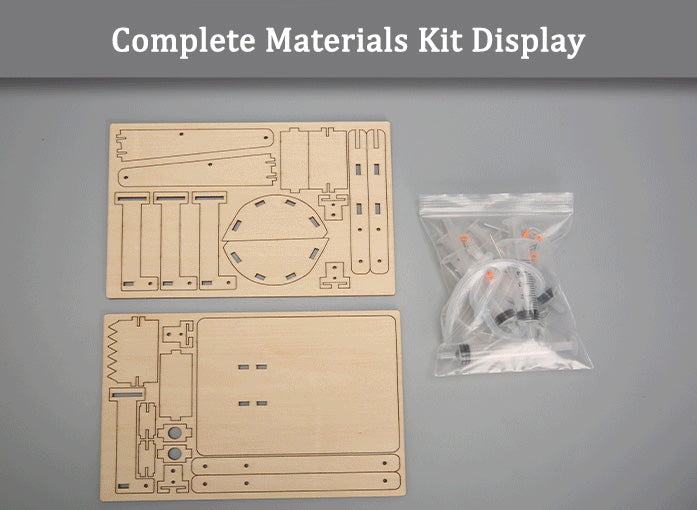 Complete materials for the DIY Hydraulic Excavator Kit, including wooden pieces and hydraulic components (syringes, tubes).