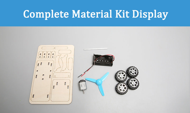 Complete DIY wind powered car kit components: laser-cut wooden pieces, motor, propeller, wheels, battery holder, and small parts for assembly.
