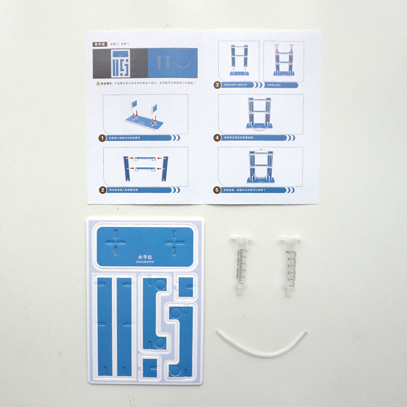 DIY Level Gauge Kit components: pre-cut plastic parts, clear tubes, and instructions. Complete science experiment kit for children.