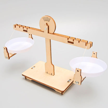 Close-up of the assembled wooden Balance Scale