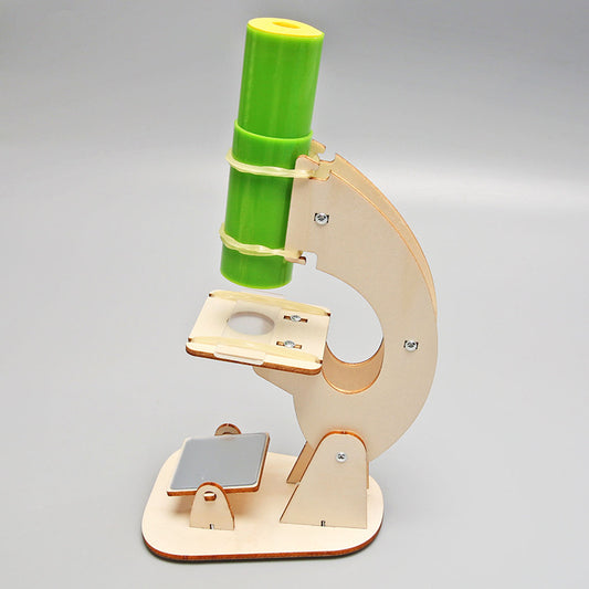 Assembled DIY wooden microscope for kids. Educational science toy for hands-on learning.