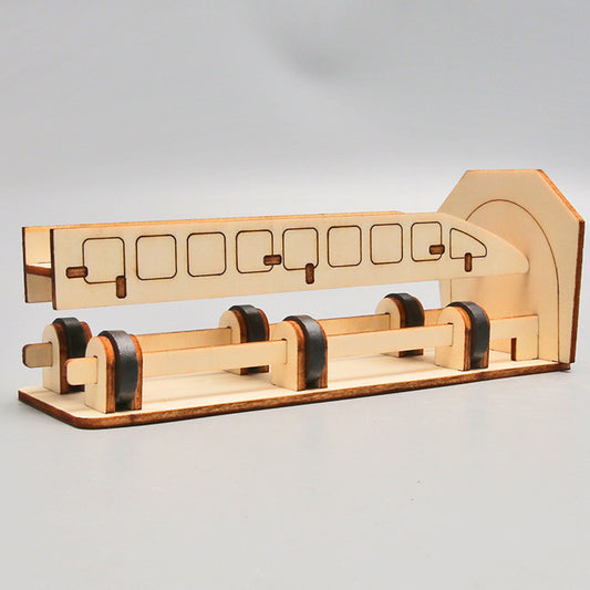 Finished DIY Maglev Train model made of wood, showcasing magnetic levitation and scientific learning.
