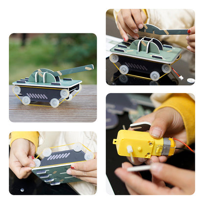Assembled green and black cardboard DIY Tank Kit, a fun and educational STEM toy for children.