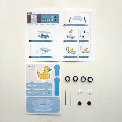 DIY Magnetic Skateboard Kit contents: cardboard, magnets, wheels, axles, instructions.
