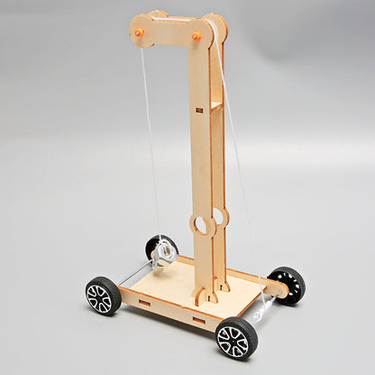 Wooden DIY Gravity Car Kit for kids, demonstrating physics principles.