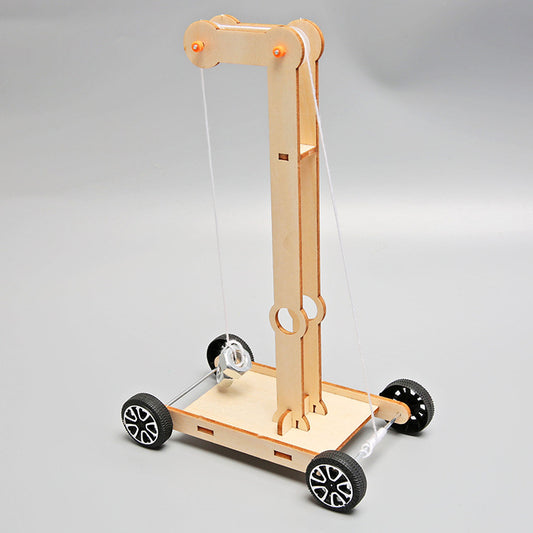 Wooden DIY Gravity Car Kit for kids, demonstrating physics principles.