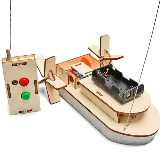 Assembled DIY wooden remote control paddle steamer boat.