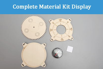 The complete material kit for a DIY wooden compass laid out: includes laser-cut wooden gear, marked compass base, bottom plate, a real compass, and a small magnet.