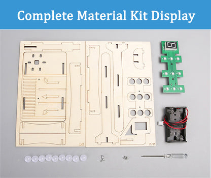 Complete material kit for the DIY Wooden Traffic Light, including laser-cut wooden pieces, circuit board with LEDs, battery holder, screws, and mini screwdriver laid out neatly.