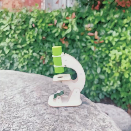 Kid-friendly DIY wooden microscope kit assembly. Learn STEM with our easy-to-build science project.