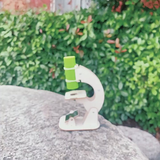 Kid-friendly DIY wooden microscope kit assembly. Learn STEM with our easy-to-build science project.