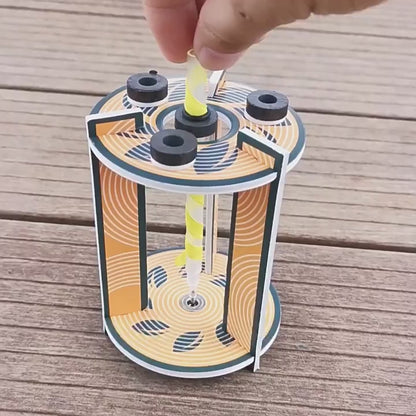 DIY Perpetual Pen Kit assembly video, showing kids building the hyperboloid toy and demonstrating its perpetual motion effect.