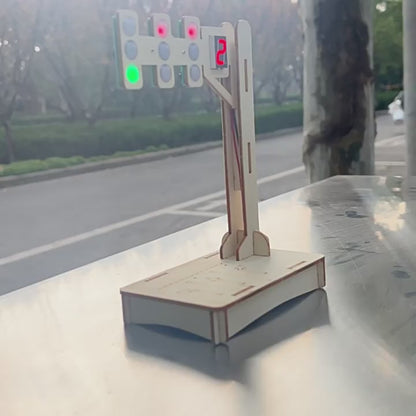 DIY Wooden Traffic Light Kit in action, showing the red, yellow, and green lights illuminating with the digital countdown timer.