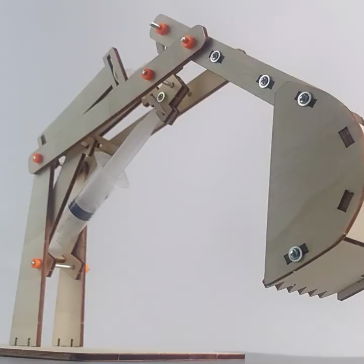 Hands-on DIY Hydraulic Excavator Kit in action, showcasing its movement and hydraulic functionality.