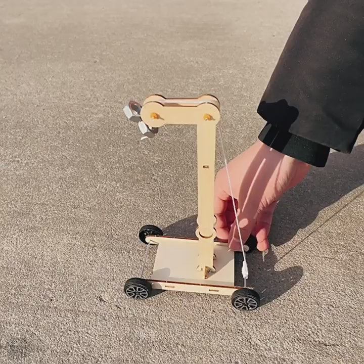 DIY Gravity-powered Car Kit assembly and demonstration for STEM education.