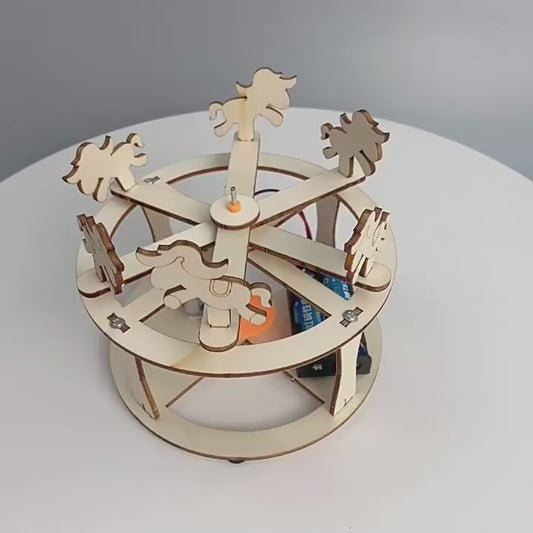 DIY Carousel Kit in action: Watch the wooden merry-go-round spin powered by a small motor.