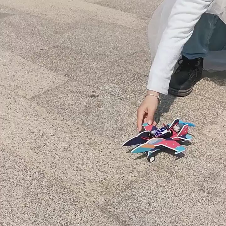 Hands-on DIY Fighter Jet Kit with motor and spinning propeller for kids.