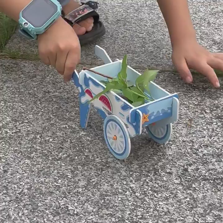 DIY Handcart Kit: Unboxing and assembly of a colorful cardboard toy wheelbarrow for kids, showcasing included materials and easy steps.