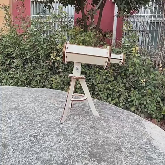DIY Astronomical Telescope Kit assembly in progress, showcasing its wooden components and lens.