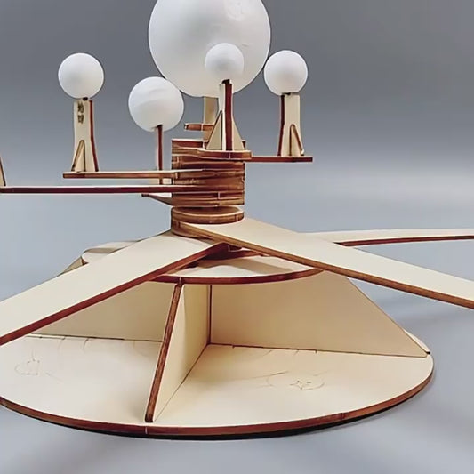 Kids assembling DIY Orrery Solar System Kit, showing planetary movements and STEM learning